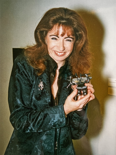 Evelyn Glennie with her "Anvilman" present, made by Stephen Lunn