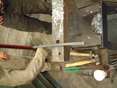 Bar forged from bloom